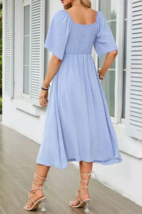 Smocked Tie Front Flutter Sleeve Midi Dress - Update AvenueEffortless Elegance: DressesTrendsi100100290691173100100290691173e8adf057 - ebe5 - 40c7 - 900a - 92ecad857d81 - Max - OriginLight Blue
