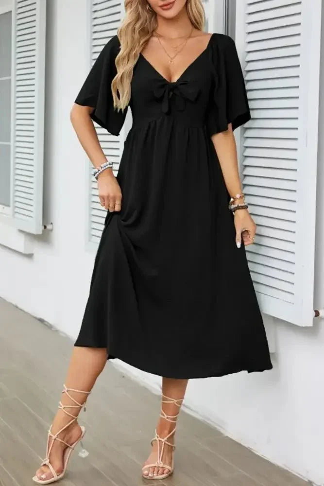 Smocked Tie Front Flutter Sleeve Midi Dress - Update AvenueEffortless Elegance: DressesTrendsi100100290691676100100290691676d010f091 - 76f3 - 45ba - 9cc1 - 2dffa8a5ea40 - Max - OriginBlack