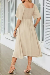 Smocked Tie Front Flutter Sleeve Midi Dress - Update AvenueEffortless Elegance: DressesTrendsi100100290692152100100290692152fcffa00e - 1078 - 430e - 8f97 - c26dd99b1509 - Max - OriginTan