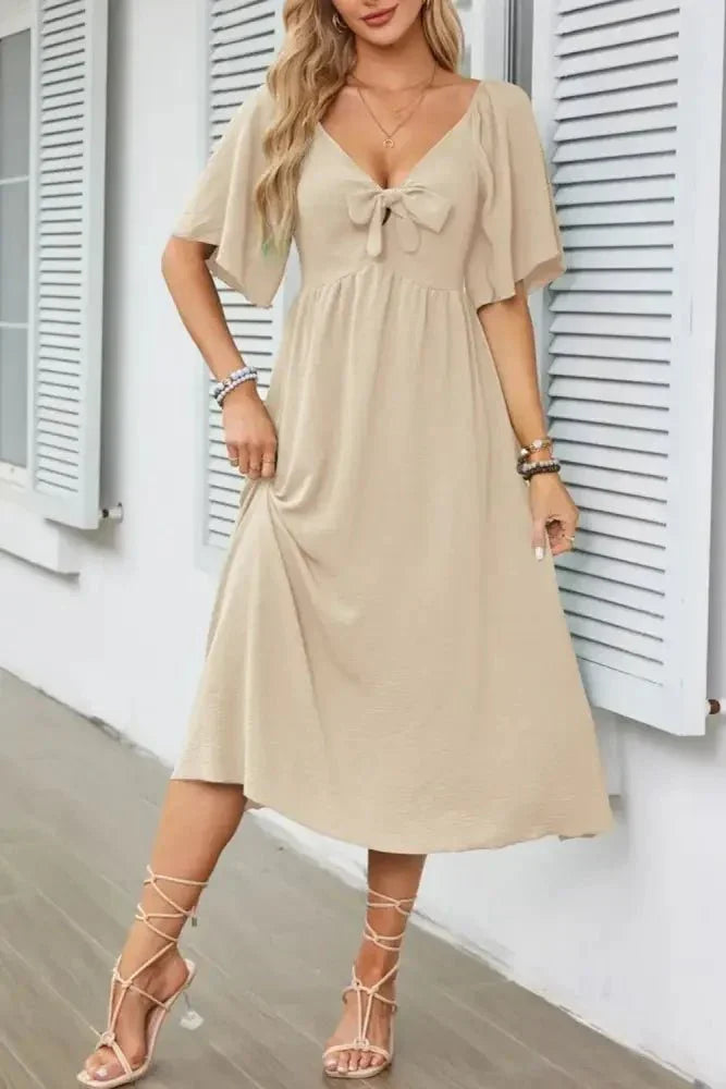 Smocked Tie Front Flutter Sleeve Midi Dress - Update AvenueEffortless Elegance: DressesTrendsi100100290692152100100290692152a9dfded9 - 0a96 - 4960 - bece - 66d14aa8463c - Max - OriginTan