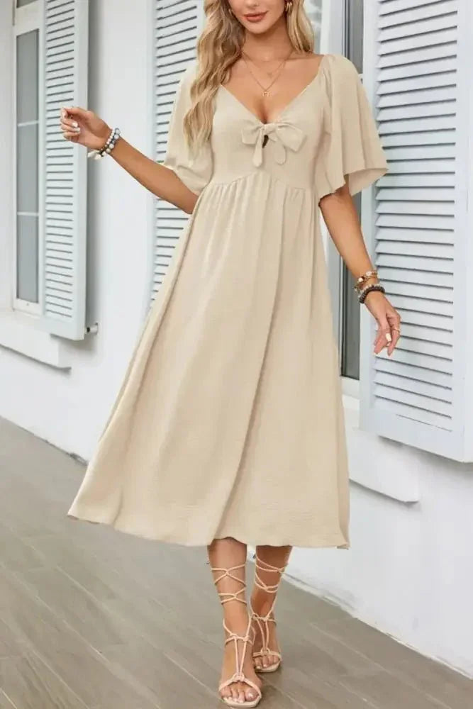 Smocked Tie Front Flutter Sleeve Midi Dress - Update AvenueEffortless Elegance: DressesTrendsi100100290692152100100290692152c90de202 - 1d00 - 4615 - 8262 - 39f16f7b0985 - Max - OriginTan