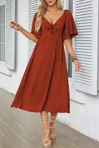 Smocked Tie Front Flutter Sleeve Midi Dress - Update AvenueEffortless Elegance: DressesTrendsi100100290692645100100290692645cb85862c - 131f - 4df9 - a85e - 5d0c60a85473 - Max - OriginRust