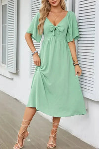 Smocked Tie Front Flutter Sleeve Midi Dress - Update AvenueEffortless Elegance: DressesTrendsi1001002906931201001002906931207ea58120 - e345 - 4c69 - 8e41 - 359025e395ae - Max - OriginGum Leaf