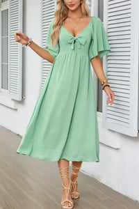 Smocked Tie Front Flutter Sleeve Midi Dress - Update AvenueEffortless Elegance: DressesTrendsi100100290693120100100290693120b092bcc7 - 68a2 - 4c57 - aca2 - 4ebab5468887 - Max - OriginGum Leaf
