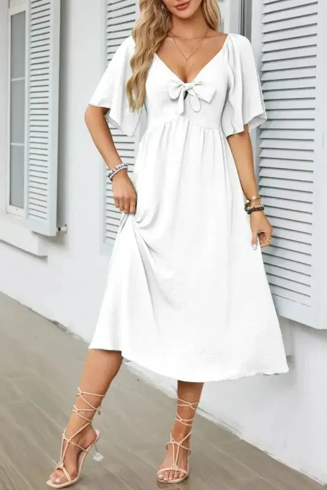 Smocked Tie Front Flutter Sleeve Midi Dress - Update AvenueEffortless Elegance: DressesTrendsi1001002906965951001002906965956b112041 - 5f88 - 41df - a53b - 342e9bc4b87b - Max - OriginWhite
