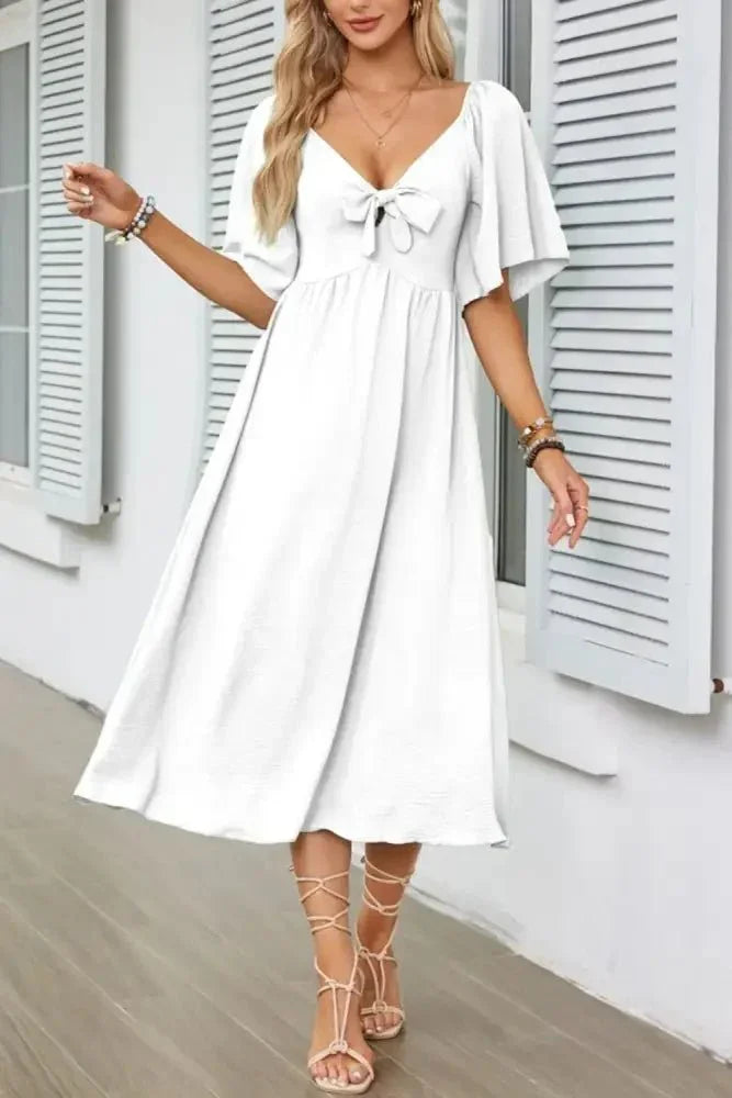 Smocked Tie Front Flutter Sleeve Midi Dress - Update AvenueEffortless Elegance: DressesTrendsi1001002906965951001002906965953ff93473 - ab5a - 4f03 - b010 - 7ca3b3df253b - Max - OriginWhite