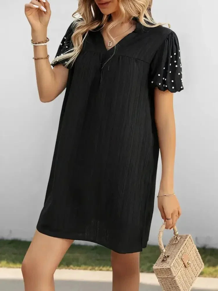 Textured V - Neck Short Sleeve Mini Dress - Update AvenueEffortless Elegance: DressesTrendsi100100423791308100100423791308992baf0d - 3ede - 4e2c - 935c - 18f82c735061 - Max - OriginBlack
