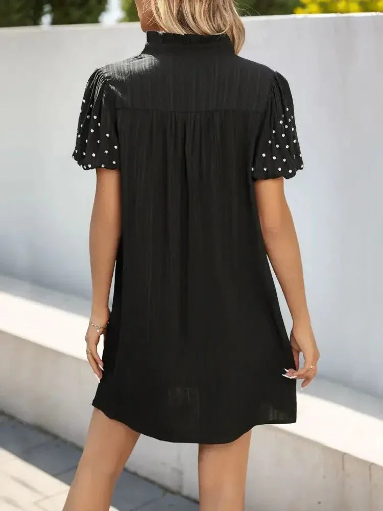 Textured V - Neck Short Sleeve Mini Dress - Update AvenueEffortless Elegance: DressesTrendsi1001004237913081001004237913081ab7ba73 - 4688 - 47cf - 9459 - 45cd312ca813 - Max - OriginBlack