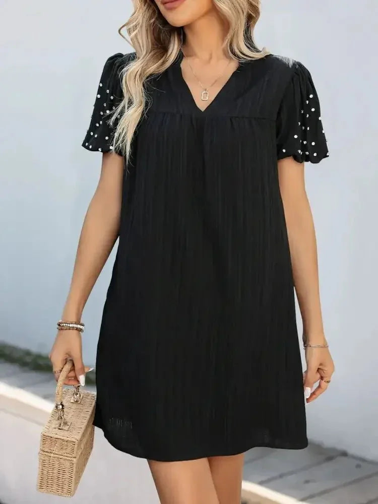 Textured V - Neck Short Sleeve Mini Dress - Update AvenueEffortless Elegance: DressesTrendsi100100423791308100100423791308597543c1 - a7f1 - 443c - 9e9e - be93b4c0cb99 - Max - OriginBlack