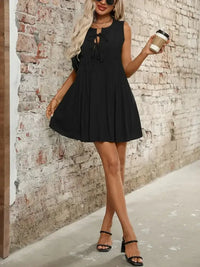 Tied Front Pleated Sleeveless Mini Dress - Update AvenueEffortless Elegance: DressesTrendsi1001007373995931001007373995930e40ff99 - 5e64 - 4c84 - 8c76 - 49cf601e8a49 - MaxBlack