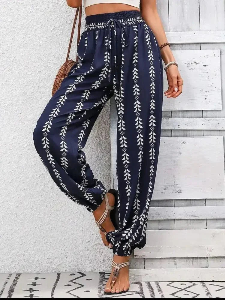 Tied Printed High Waist Pants - Update AvenueBoho VibesTrendsi100100994771982100100994771982e1d4faba - 694b - 45c6 - 8de8 - f7a2ef69c15d - MaxDark Blue