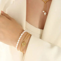 Titanium Steel Three - Layered Pearl Bracelet - Update AvenueBraceletsTrendsi100500630121447100500630121447Titanium Steel Three - Layered Pearl BraceletGold