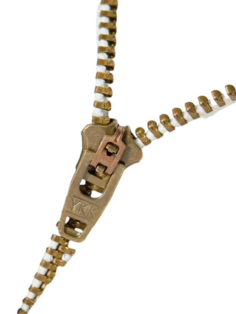 Partially unzipped metal zipper on light-colored wide leg jeans for Men