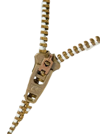 Partially unzipped metal zipper on light-colored wide leg jeans for Men
