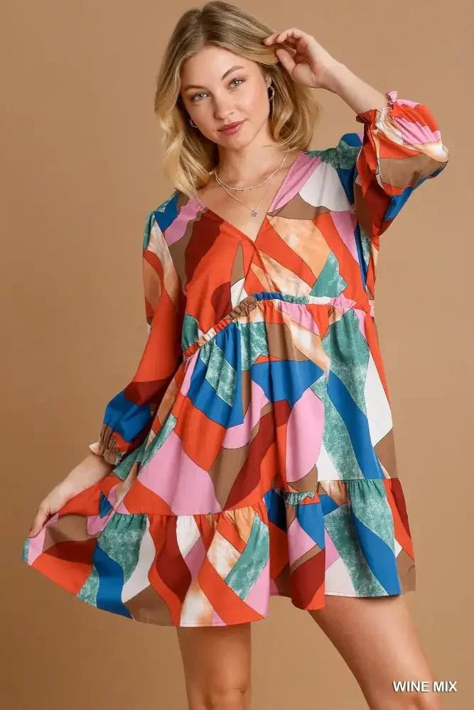 Umgee Abstract V - Neck Tiered Printed Dress - Update AvenueCasual DressesTrendsi100100697231144100100697231144Umgee Abstract V - Neck Tiered Printed DressWINE MIX