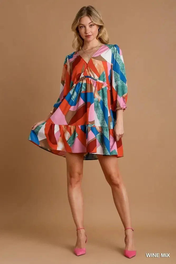 Umgee Abstract V - Neck Tiered Printed Dress - Update AvenueCasual DressesTrendsi100100697231144100100697231144Umgee Abstract V - Neck Tiered Printed DressWINE MIX