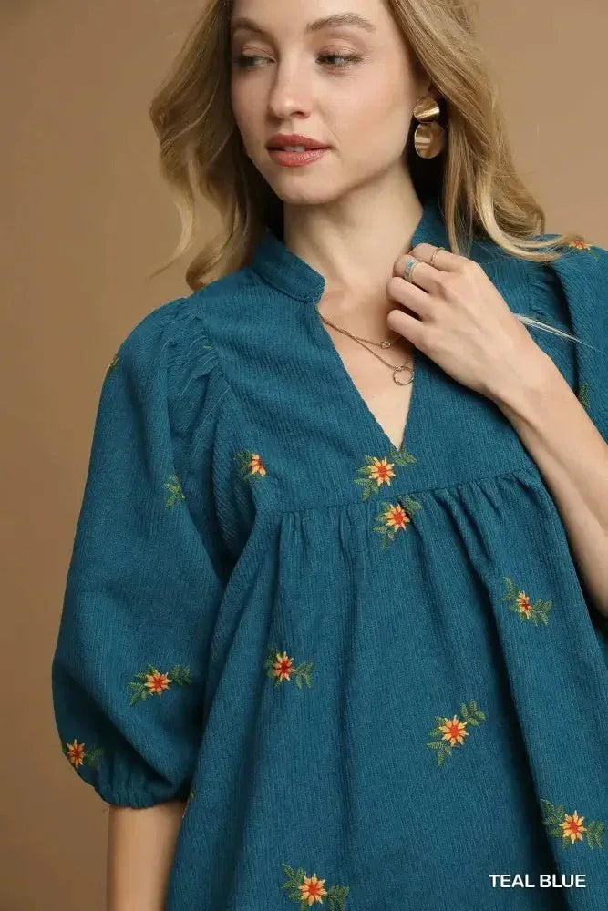 Umgee Corduroy Babydoll Dress with Floral Embroidery - Update AvenueCasual DressesTrendsi100100647025410100100647025410Umgee Corduroy Babydoll Dress with Floral EmbroideryTEAL BLUE
