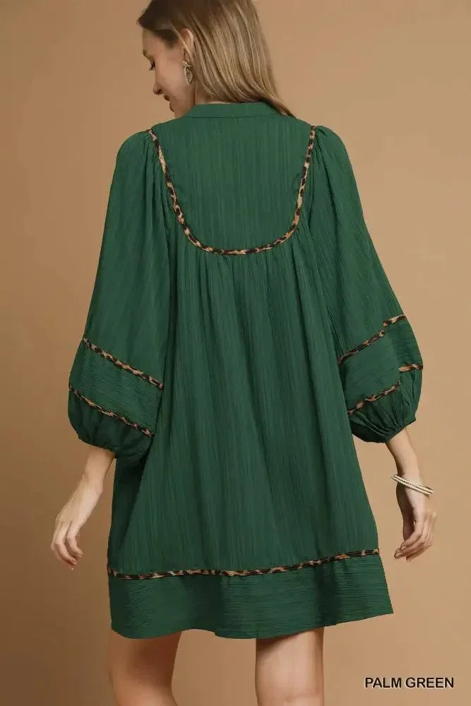 Umgee Textured Babydoll Dress with Leopard Trim - Update AvenueCasual DressesTrendsi100100242031616100100242031616Umgee Textured Babydoll Dress with Leopard TrimPALM GREEN