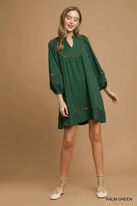 Umgee Textured Babydoll Dress with Leopard Trim - Update AvenueCasual DressesTrendsi100100242031616100100242031616Umgee Textured Babydoll Dress with Leopard TrimPALM GREEN