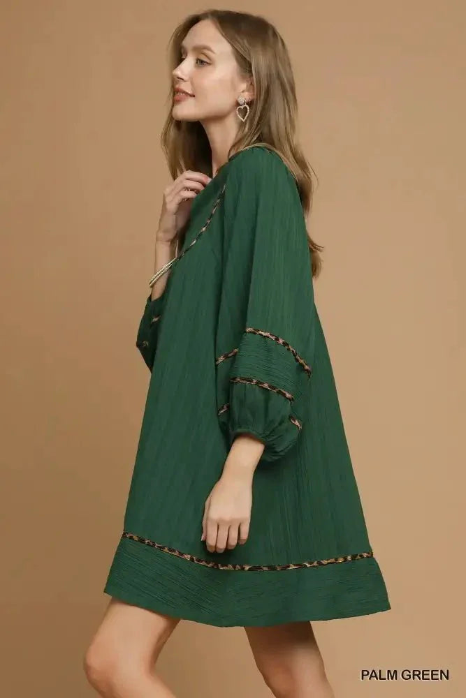Umgee Textured Babydoll Dress with Leopard Trim - Update AvenueCasual DressesTrendsi100100242031616100100242031616Umgee Textured Babydoll Dress with Leopard TrimPALM GREEN